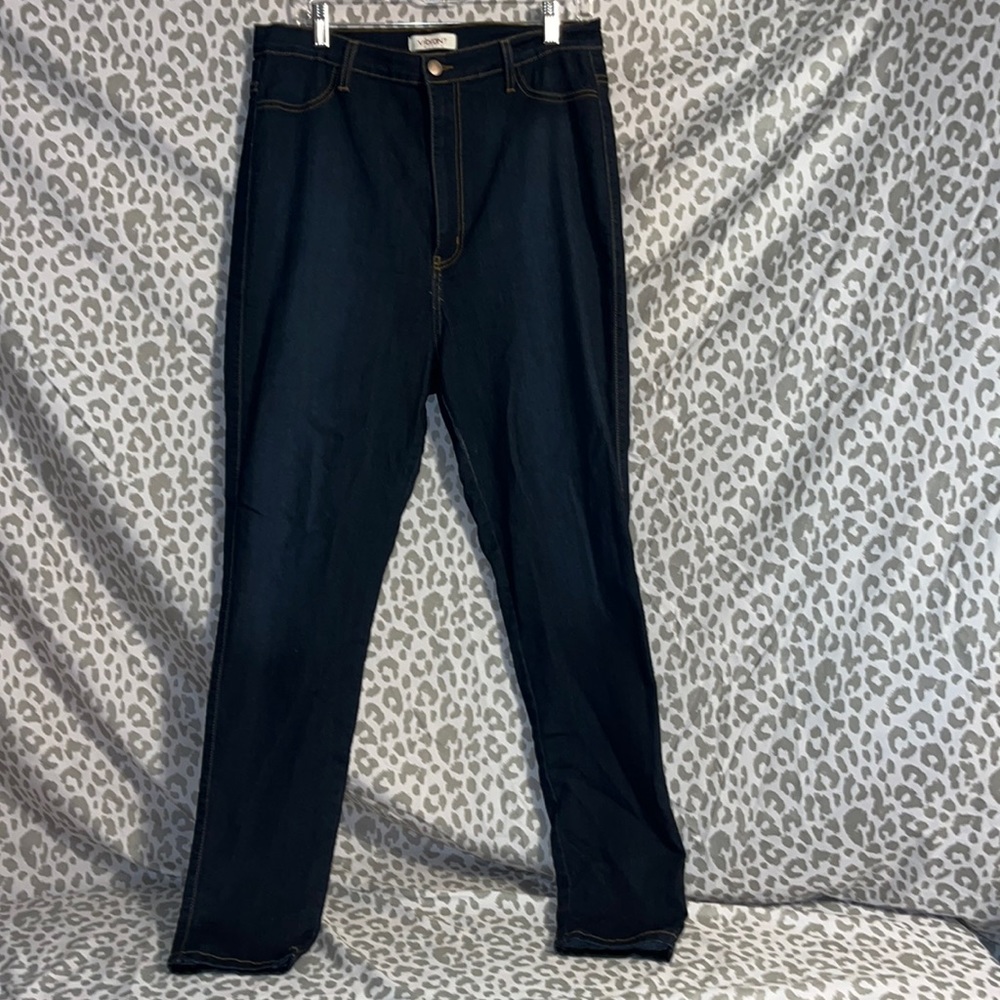 Vibrant dark wash gently worn high waist distressed skinny leg jeans